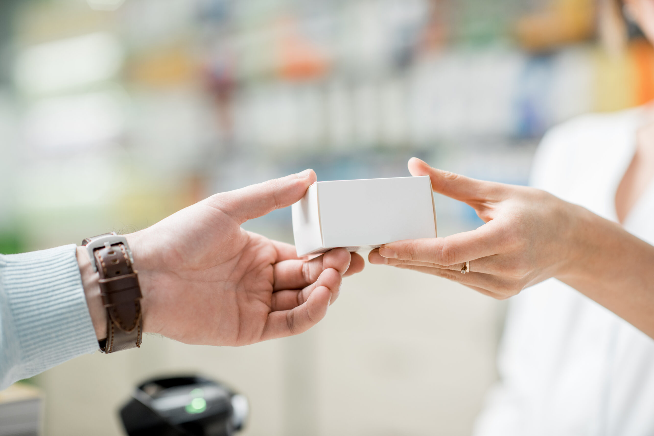 Giving madication at the pharmacy counter